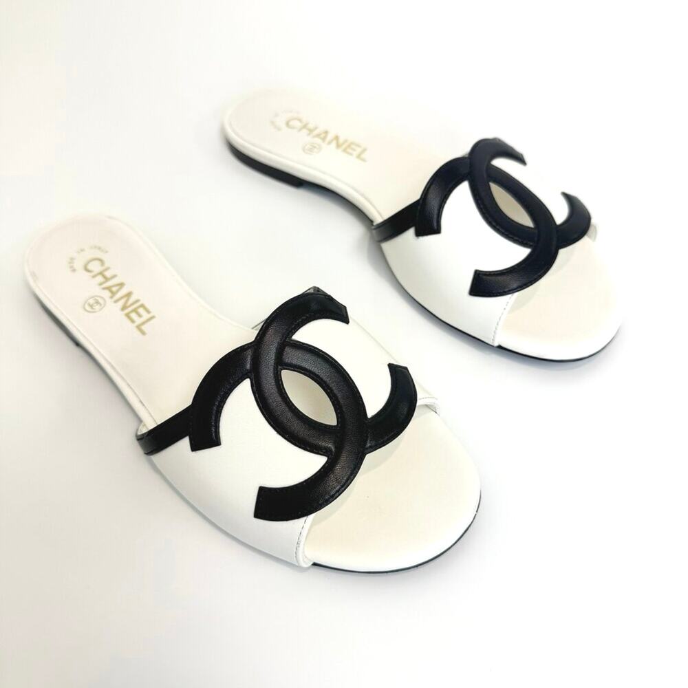 CHANEL 2026 CC Black White Leather Logo Mules 37.5 Slide Sandal Interlocking 26S